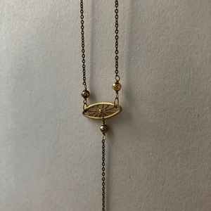 Delicate gold body chain